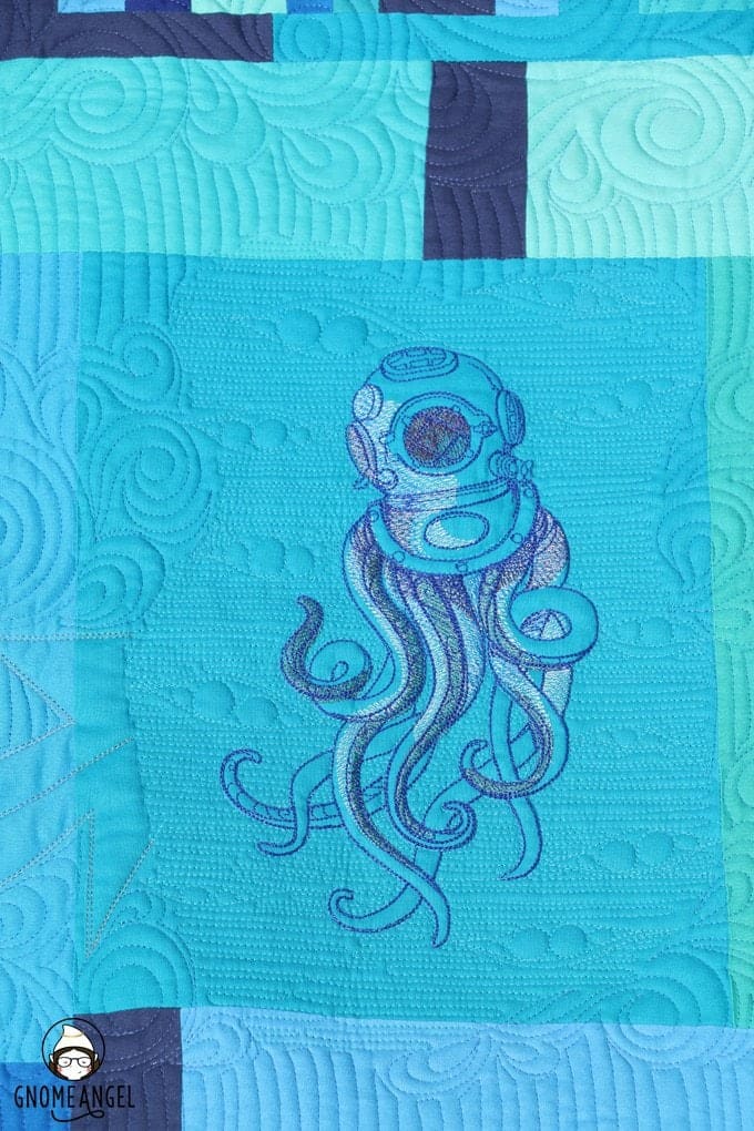 "Son of a Son of a Sailor" - Designed, embroidered and pieced by Angie Wilson of www.GnomeAngel.com using Robert Kaufman Kona and Urban Threads Embroidery Patterns. Custom quilted by Raylee Bielenberg of Sunflower Quilting | Find out more at www.GnomeAngel.com