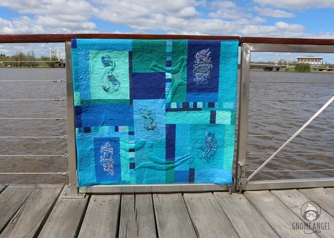 "Son of a Son of a Sailor" - Designed, embroidered and pieced by Angie Wilson of www.GnomeAngel.com using Robert Kaufman Kona and Urban Threads Embroidery Patterns. Custom quilted by Raylee Bielenberg of Sunflower Quilting | Find out more at www.GnomeAngel.com