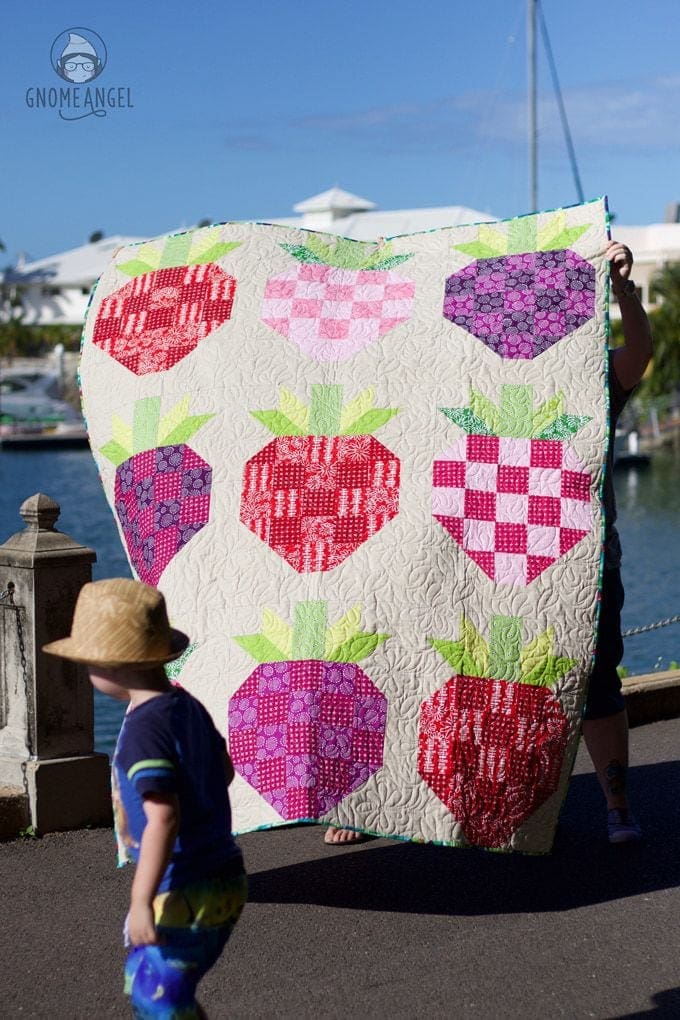 Strawberry Fields - Upscaled strawberry block based on Bec Skyberries strawberry block tutorial. Quilt made with Blueberry Park and Essex Linen by Robert Kaufman. Quilted by Raylee Bielenberg of Sunflower Quilting. Find out more on www.GnomeAngel.com